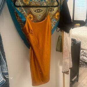 Burnt orange perfect dress for  fall size Large material is spandex 82% nylon